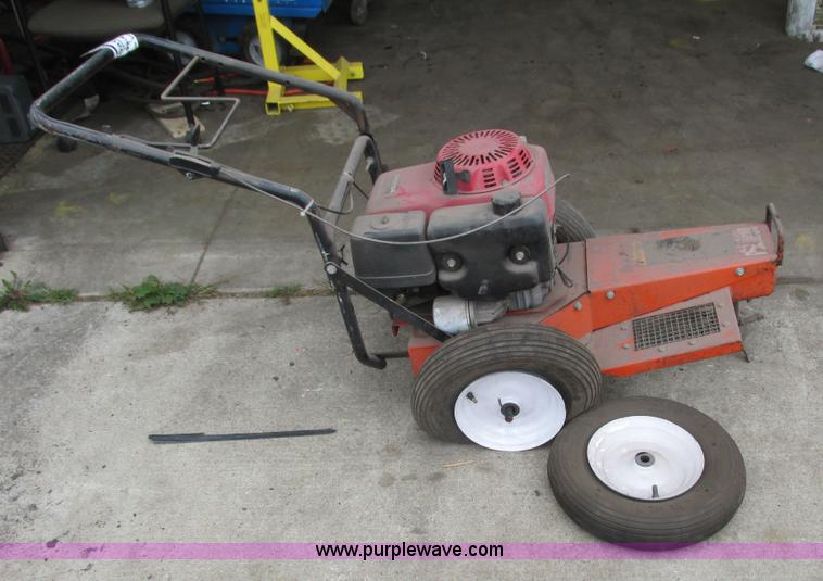 Bear Cat brush cutter in Rochester, MN Item K6715 sold Purple Wave