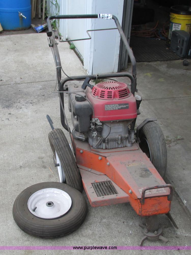 Bear Cat brush cutter in Rochester, MN Item K6715 sold Purple Wave