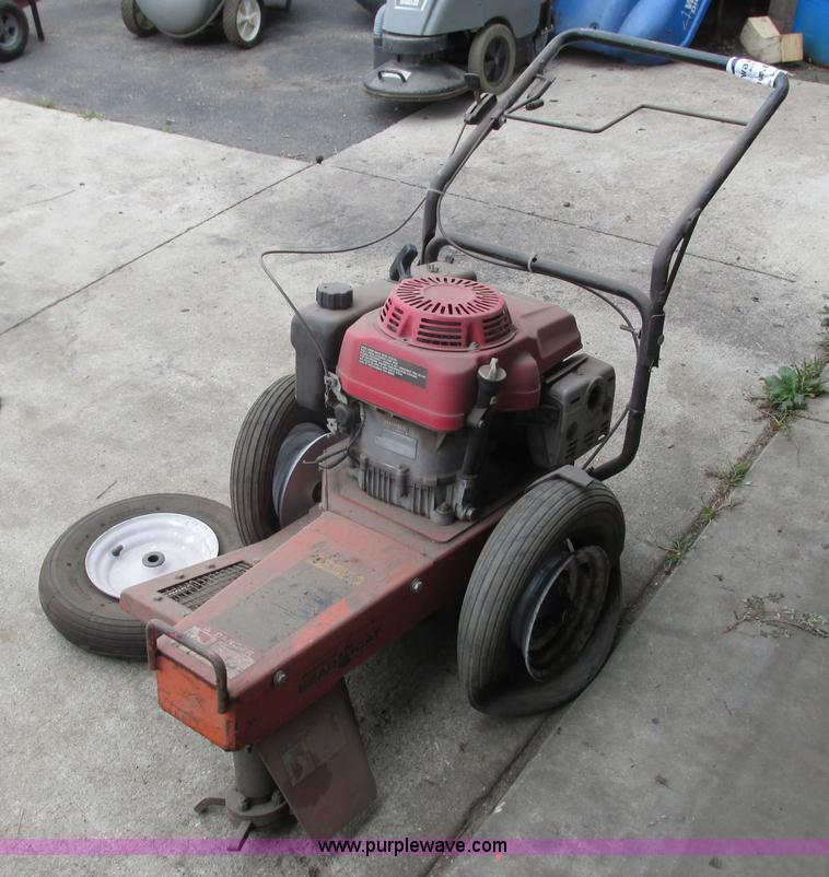 Bear Cat brush cutter in Rochester, MN Item K6715 sold Purple Wave