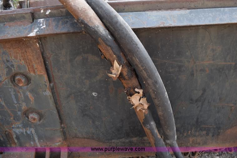 image for item L5938 Woods Bushwacker rotary mower skid steer attachment