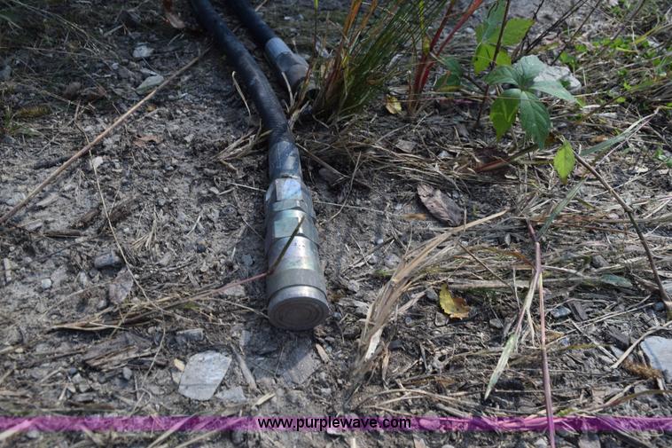 image for item L5938 Woods Bushwacker rotary mower skid steer attachment