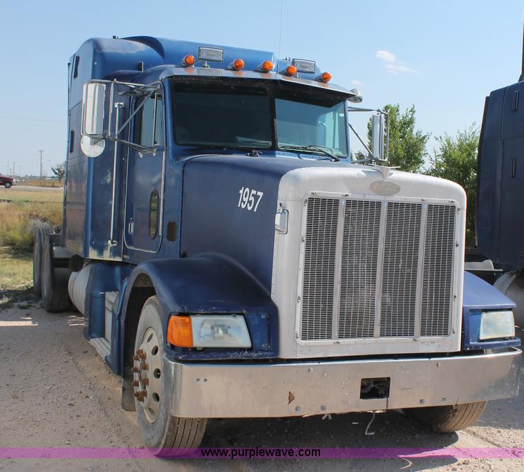 image for item J1446 1999 Peterbilt 377 semi truck