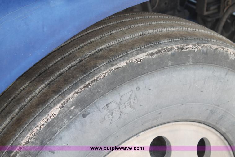 image for item J1446 1999 Peterbilt 377 semi truck