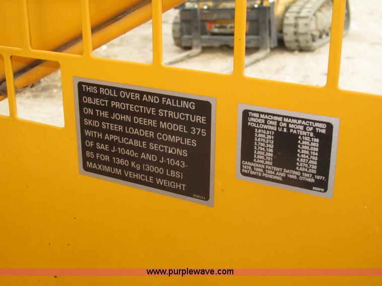 image for item H1132 1991 John Deere 375 skid steer