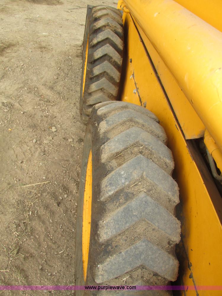 image for item H1132 1991 John Deere 375 skid steer