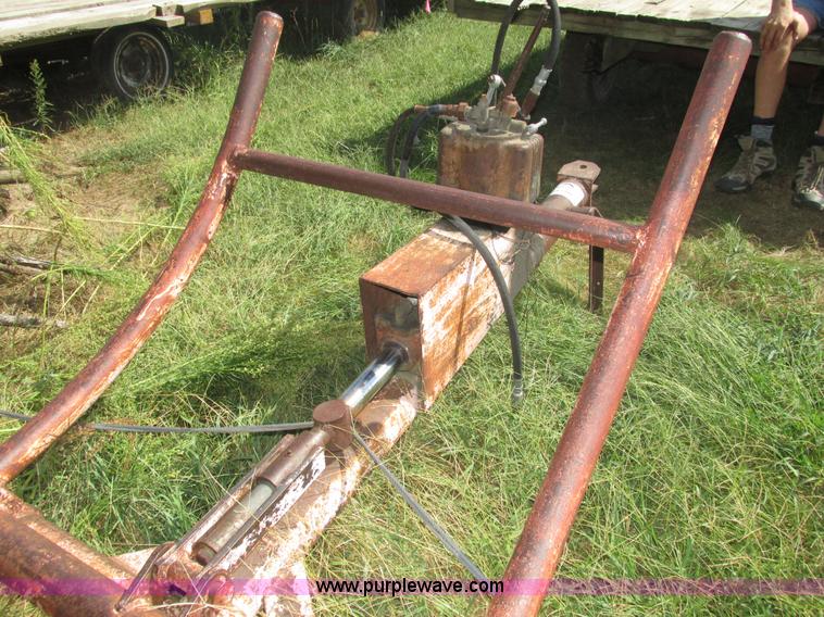 image for item H1156 Shop built hydraulic bale carrier and hay rack