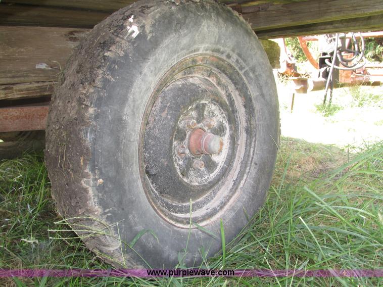 image for item H1156 Shop built hydraulic bale carrier and hay rack