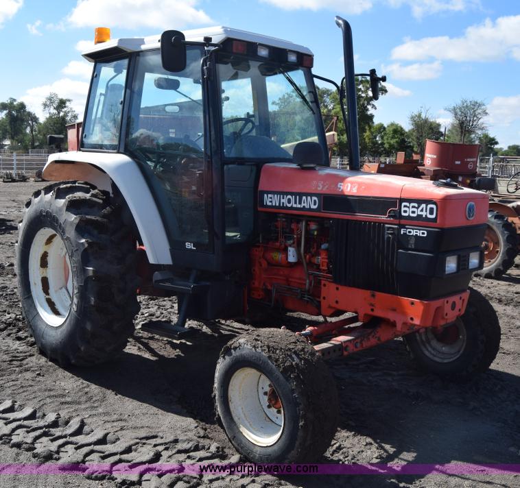 image for item J7108 New Holland 6640 tractor