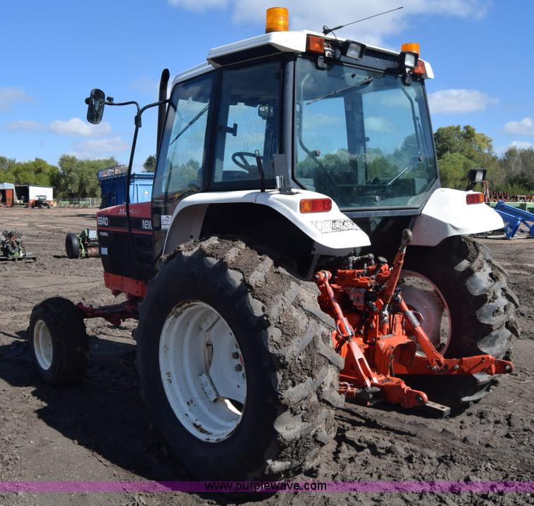 image for item J7108 New Holland 6640 tractor