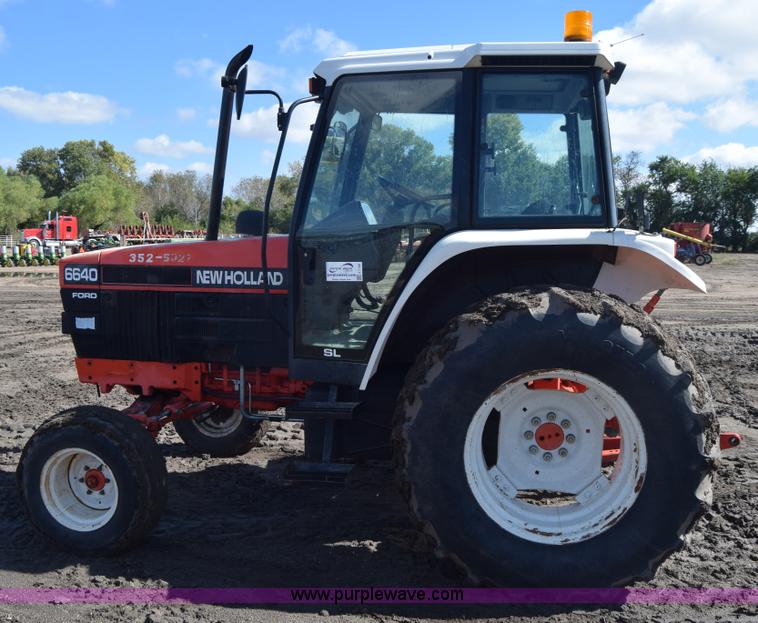 image for item J7108 New Holland 6640 tractor