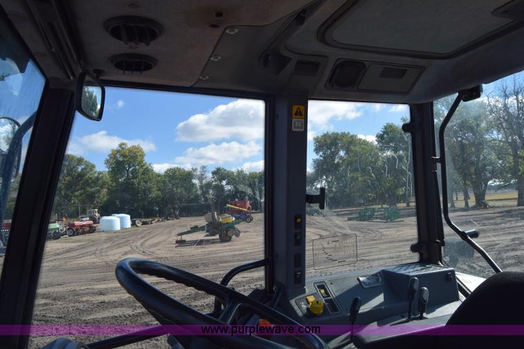 image for item J7108 New Holland 6640 tractor