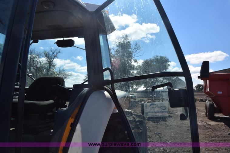 image for item J7108 New Holland 6640 tractor