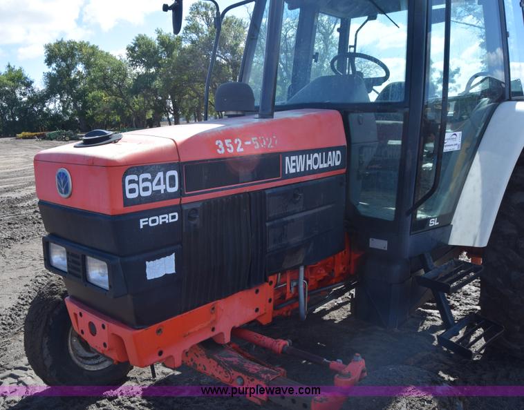 image for item J7108 New Holland 6640 tractor