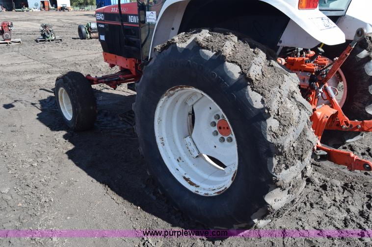 image for item J7108 New Holland 6640 tractor