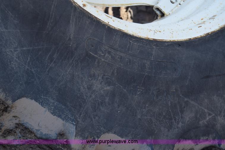 image for item J7108 New Holland 6640 tractor