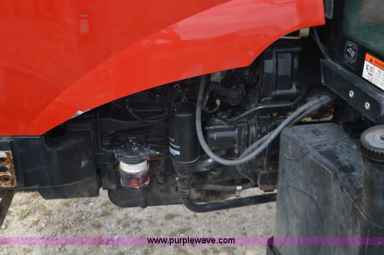 image for item J8708 2013 Case 110A tractor