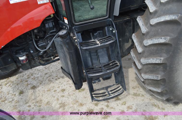 image for item J8708 2013 Case 110A tractor