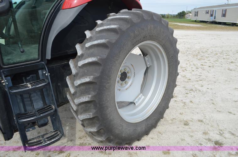 image for item J8708 2013 Case 110A tractor