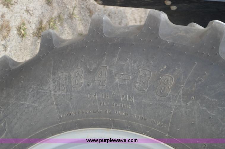 image for item J8708 2013 Case 110A tractor