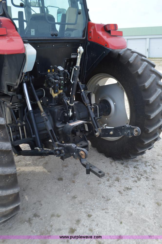 image for item J8708 2013 Case 110A tractor