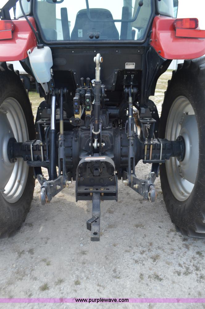 image for item J8708 2013 Case 110A tractor