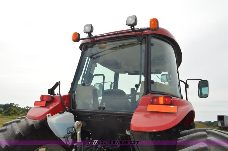 image for item J8708 2013 Case 110A tractor