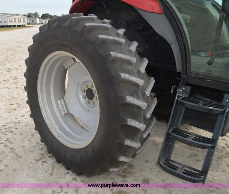 image for item J8708 2013 Case 110A tractor