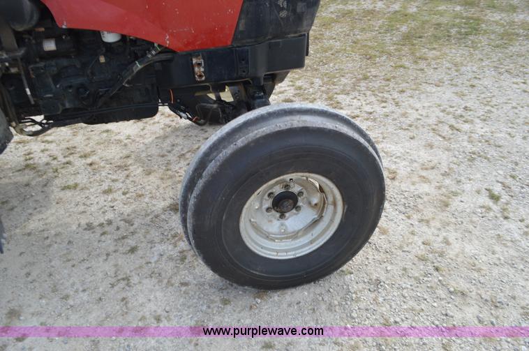 image for item J8708 2013 Case 110A tractor