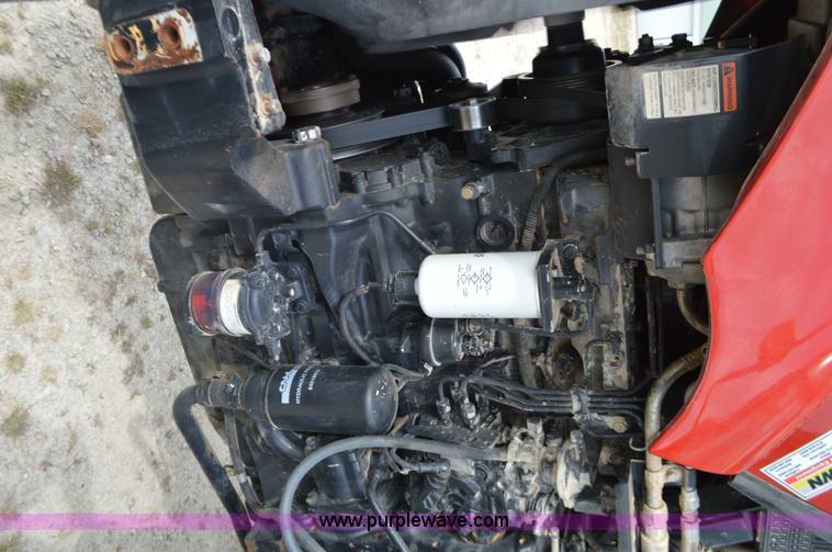 image for item J8708 2013 Case 110A tractor