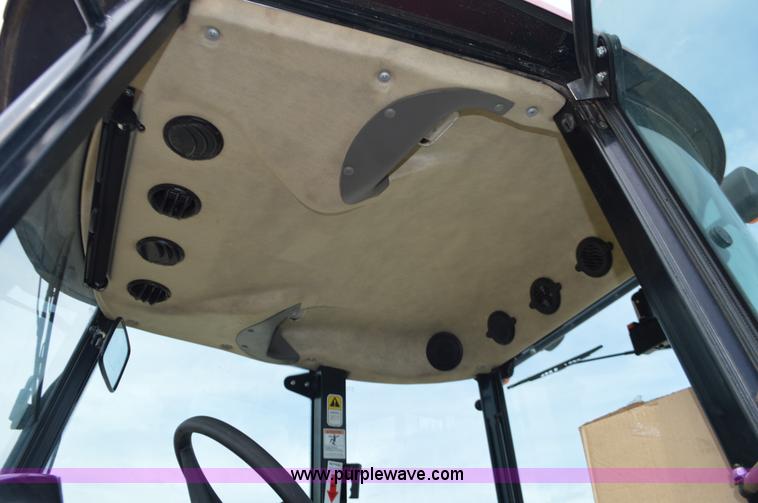 image for item J8708 2013 Case 110A tractor