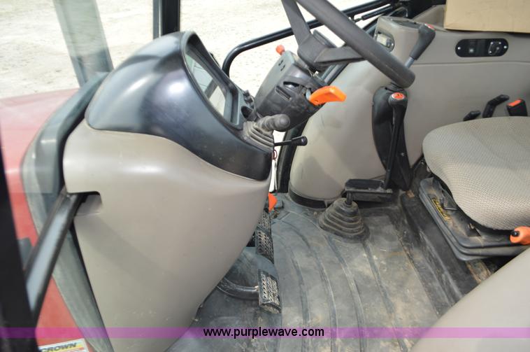 image for item J8708 2013 Case 110A tractor