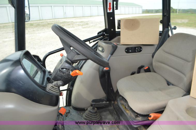 image for item J8708 2013 Case 110A tractor