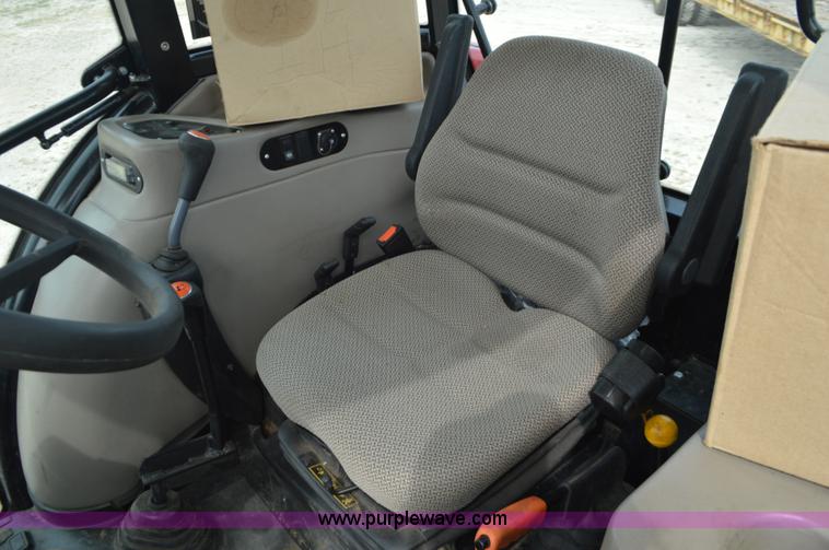 image for item J8708 2013 Case 110A tractor