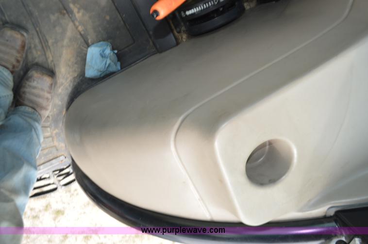 image for item J8708 2013 Case 110A tractor