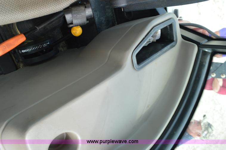 image for item J8708 2013 Case 110A tractor