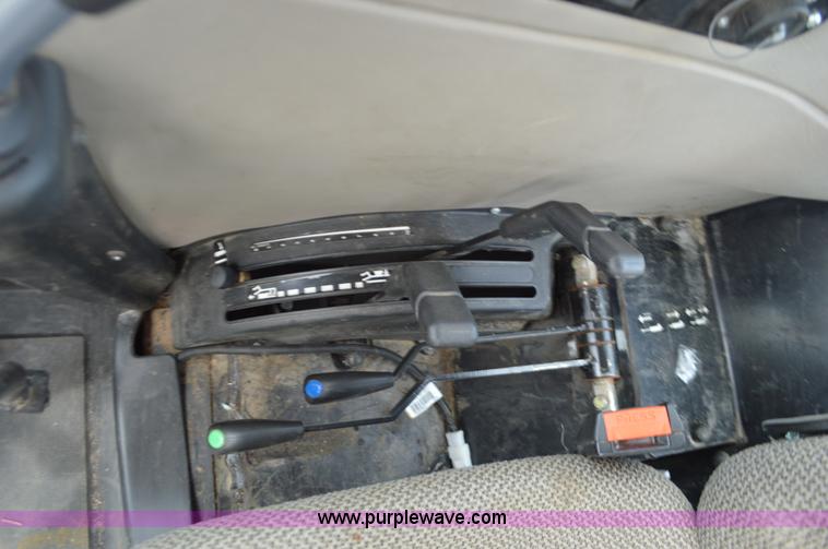 image for item J8708 2013 Case 110A tractor