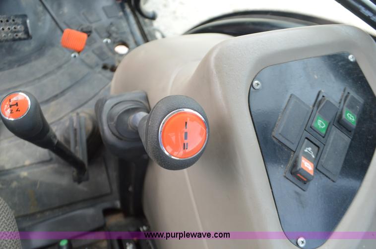 image for item J8708 2013 Case 110A tractor