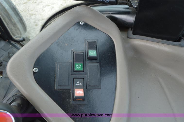 image for item J8708 2013 Case 110A tractor