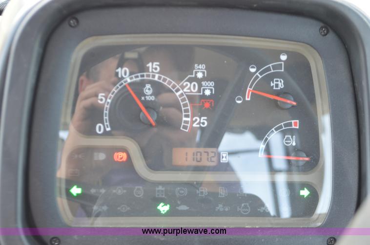 image for item J8708 2013 Case 110A tractor