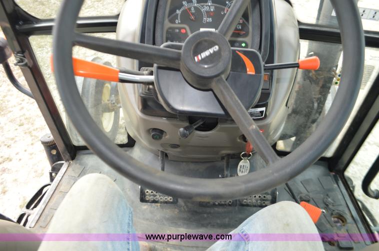 image for item J8708 2013 Case 110A tractor