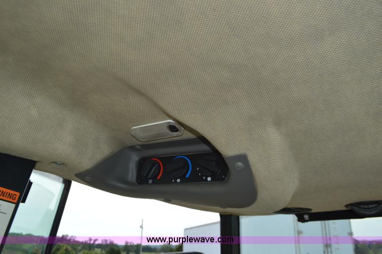 image for item J8708 2013 Case 110A tractor