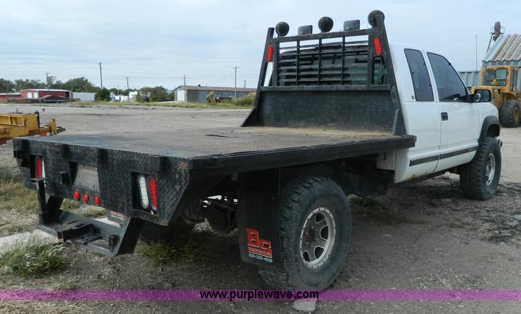 image for item BT9929 1998 Chevrolet 1500 Ext. Cab flatbed pickup truck