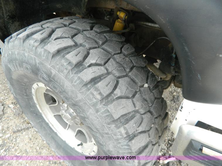 image for item BT9929 1998 Chevrolet 1500 Ext. Cab flatbed pickup truck