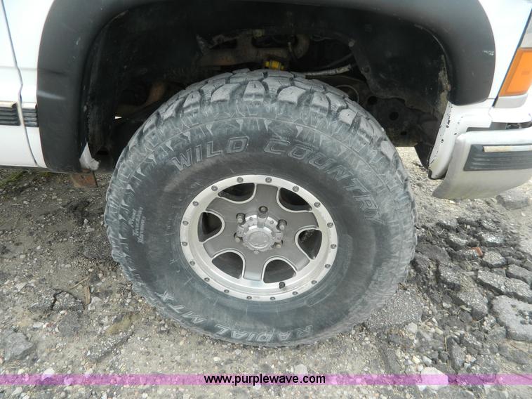 image for item BT9929 1998 Chevrolet 1500 Ext. Cab flatbed pickup truck