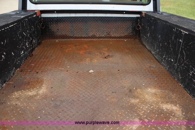 image for item J3627 1988 Ford F150 flatbed pickup truck