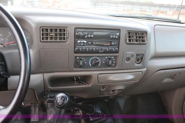 image for item J4396 2001 Ford F450 Super Duty flatbed truck