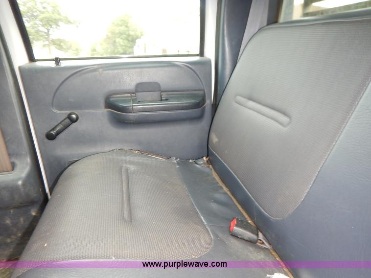 image for item J6380 2000 Ford F350 Crew Cab flatbed pickup truck