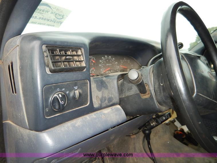 image for item J6380 2000 Ford F350 Crew Cab flatbed pickup truck