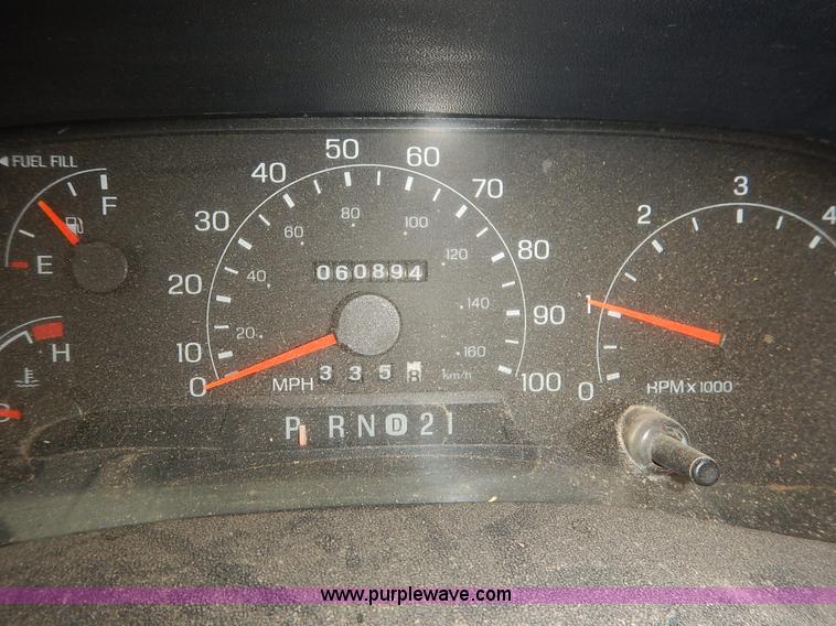 image for item J6380 2000 Ford F350 Crew Cab flatbed pickup truck