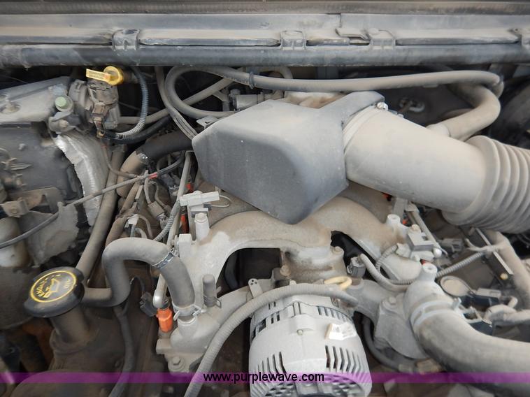 image for item J6380 2000 Ford F350 Crew Cab flatbed pickup truck